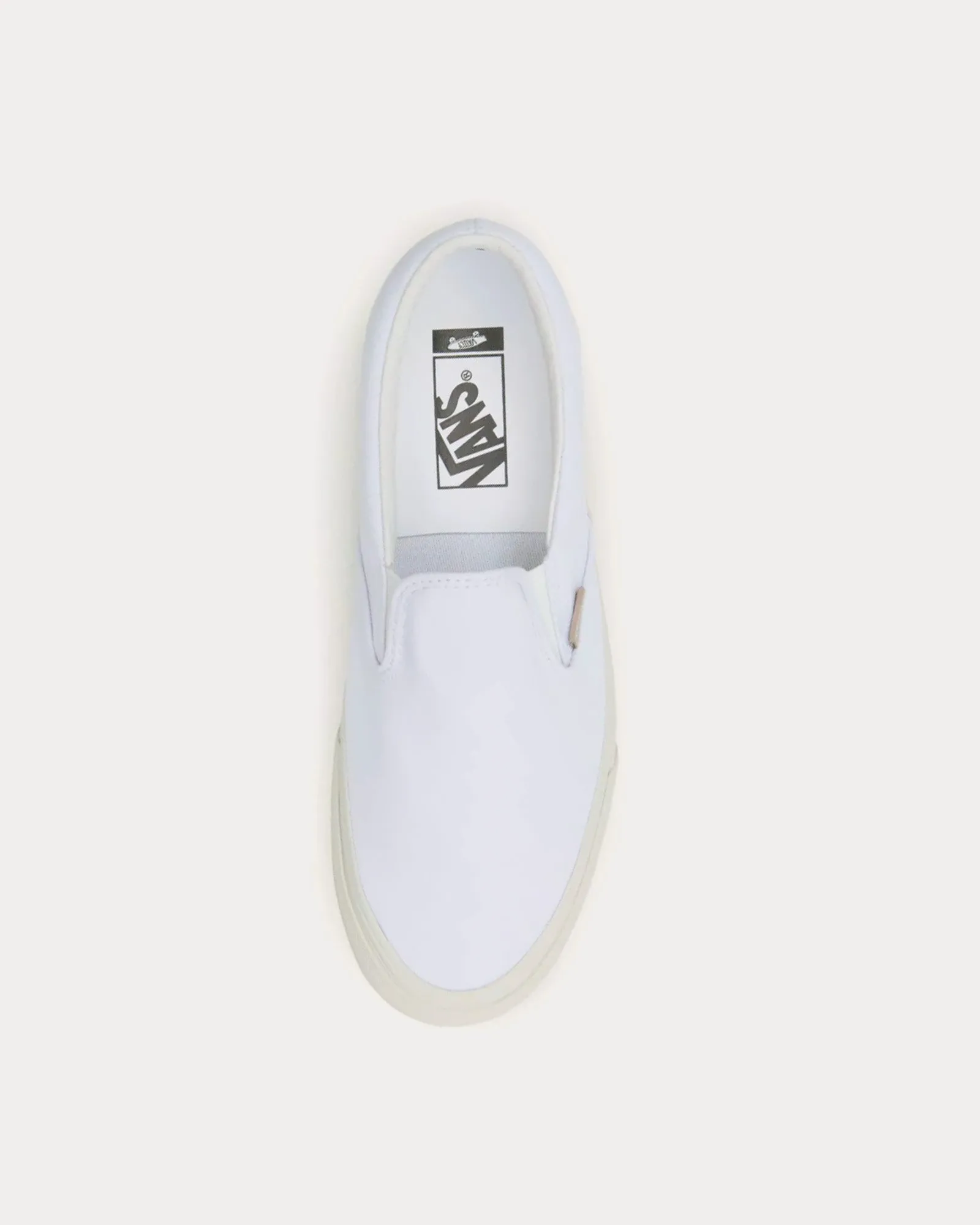 Classic LX White Slip On Sneakers